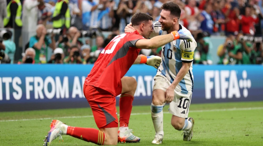 Lionel Messi and Argentina celebrate after defeating the Netherlands at the  2022 FIFA World Cup 